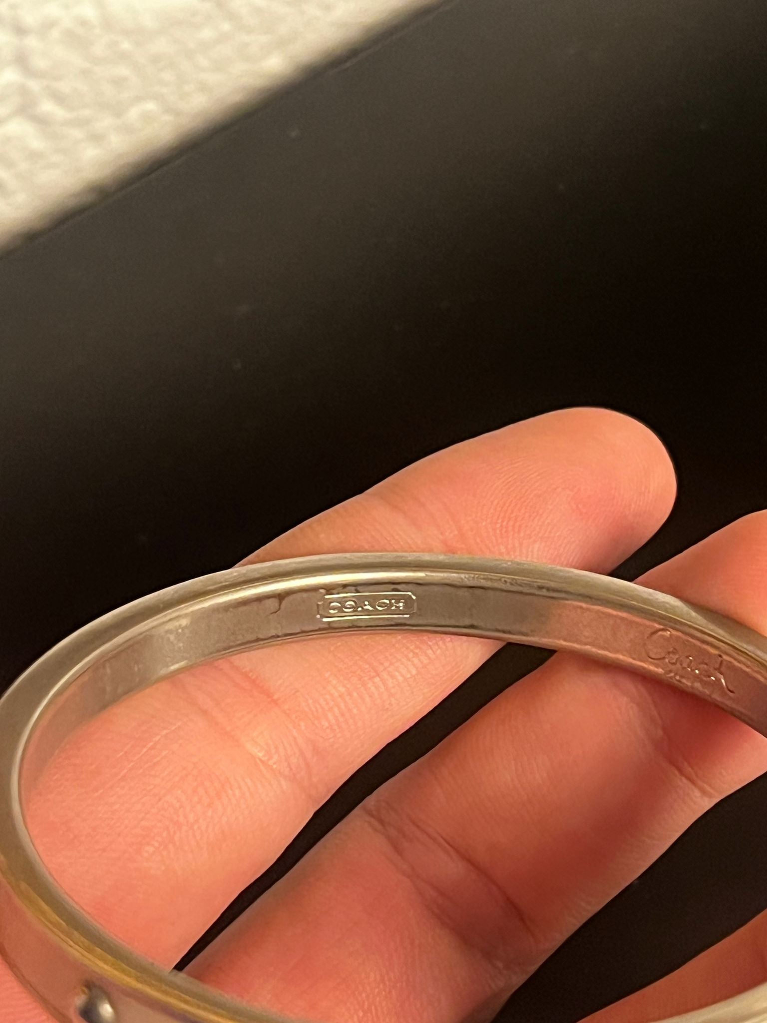 COACH Armreif Silber Nieten Design